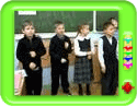 A group of kids reciting 'Cobbler, cobbler mend my shoe'