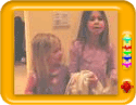 Two sibblings singing poem 'Hush-a-baby'