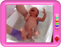 Baby's first bath from midwife