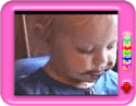 Baby and his sibling eating chocolate pudding